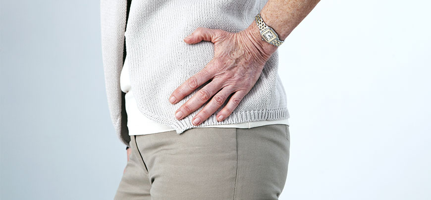 Patient experiencing hip pain  and in need of a chiropractor